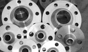 Stainless steel flanges with precision-drilled bolt holes used in piping and industrial applications.