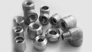Stainless steel pipe fittings including elbows, couplings, and reducers for industrial and plumbing applications.